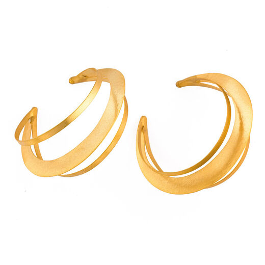 Gold layered hoop earrings by Fotini Liami